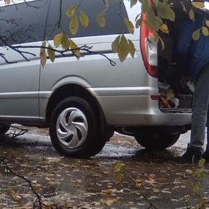 Van man on a rainy day