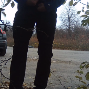 Cleaning out his car and peeing in the bushes