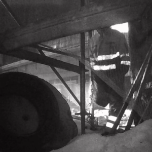 Worker pissing at the work site