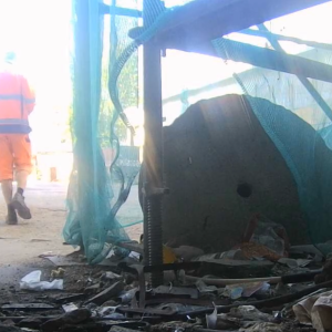 Workers at the construction site and dumping field
