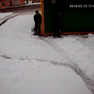 Making some yellow snow behind the shop