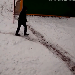 Another man makes a dash behind the shed